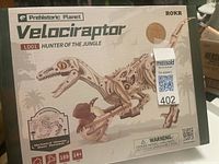 Front of sealed ROKR Velociraptor LD01 Prehistoric Planet model kit box