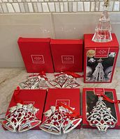 Group shot of all ornaments and their boxes