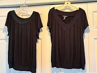Both tops hanging side by side showing overall style and size
