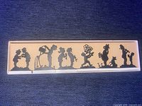 Full set of eight silhouette holders in box base