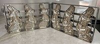 Mold opened flat showing six halves creating three full Bugs Bunny cavities