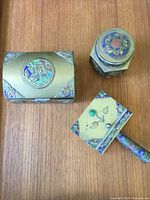 Three-piece brass champlevé enamel smoking set overview