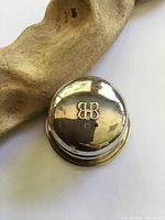 Top view showing round domed lid with BB monogram