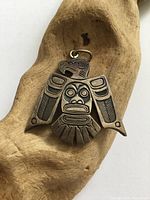 Front view of sterling silver Northwest Coast Indigenous bird pendant