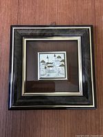 Front view of framed plaque