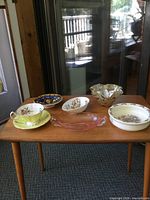 All six decorative pieces arranged on table