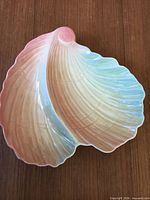 Top view of pastel shell-shaped ceramic dish