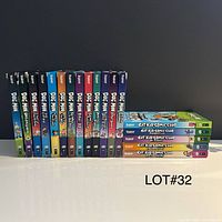 Front spines of all Dog Man and Cat Kid books