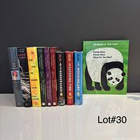 Front view showing all standing hardcovers and children’s board book