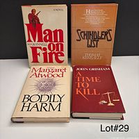 Front covers of the four hardcover novels