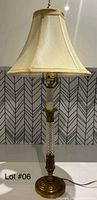 Full view of lamp with shade attached showing overall design and proportions