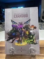 Front cover sealed in plastic wrap on stand