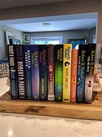 Front view of 11 Jesse Stone hardcover novels on shelf