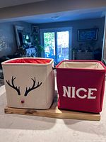 Both storage cubes side by side showing designs and size difference