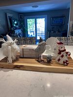 all six decor pieces grouped on countertop