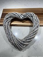 Front view of woven rattan heart wreath