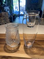 Both glass pieces side by side on table