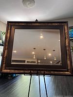 Front view of mirror showing frame and bevel