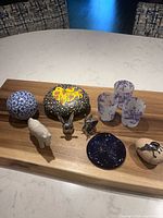 all ten décor pieces grouped on board