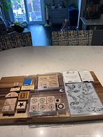 All stamp sets and loose stamps on board