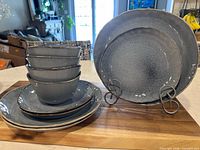 Full set stacked showing plates and bowls