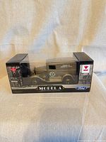Front view of boxed 1:24 scale Ford Model A coin bank