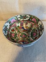 Interior of bowl showing full Famille Rose decoration