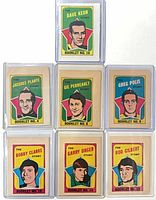 Front covers of all seven booklets in sleeves