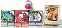 Bakugan ball with four sample cards Pleasant Stone, G-Power Increase, Banish Trickery, Great Mountain Breaker