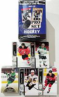 Group shot showing sealed Pro Set hobby box and several Upper Deck sample cards