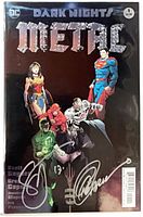 Full view of bagged Dark Nights: Metal #1 comic with foil title and signatures