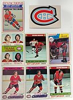 Fronts of eight Guy Lafleur cards and Canadiens decal