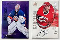Both trading cards side by side showing fronts and serial numbers