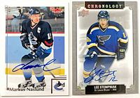 Both autographed cards front view