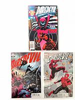 All three comic issues front covers displayed