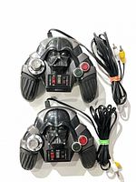 Both Darth Vader plug & play controllers with attached RCA cables