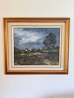 Front view of framed painting showing full artwork and frame