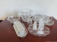 group shot of all twelve glass pieces on table
