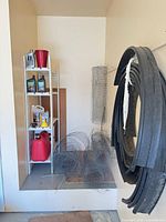Overall lot: shelf, gas can, chicken wire, fluids