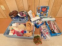 overall view of tote, tins and additional boxes of craft materials
