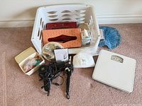 Group shot of entire lot showing scale, tissue covers, hair tools, shells, accessories, basket