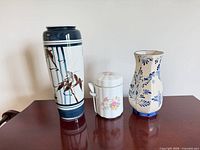 Front view of all three ceramic pieces