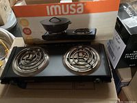 Hot plate front view with two burners and box behind