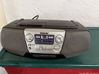 Front view of Sony CFD-V5 showing cassette deck, control panel, speakers