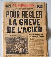 Front page showing masthead, date, price and headline