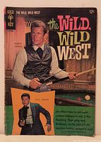Front cover of The Wild Wild West Gold Key comic book showing Robert Conrad and inset of Ross Martin, 12¢ price.