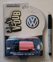Front of sealed blister card showing the GreenLight V-Dub 1964 Volkswagen Type 2 Panel Van diecast model