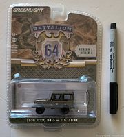 Front view of sealed GreenLight Battalion 64 Series 1 1970 Jeep DJ-5 U.S. Army die-cast on card with marker for scale (marker not included)