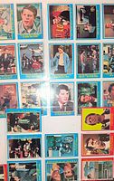 Assorted Happy Days trading cards with blue and red borders