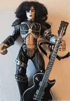 Full view of action figure showing costume, articulation and accessories